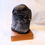 Thumbnail: A carved granite bird sculpture Description