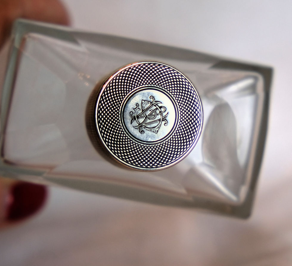 Thumbnail: A pair of George V silver and clear glass scent flasks