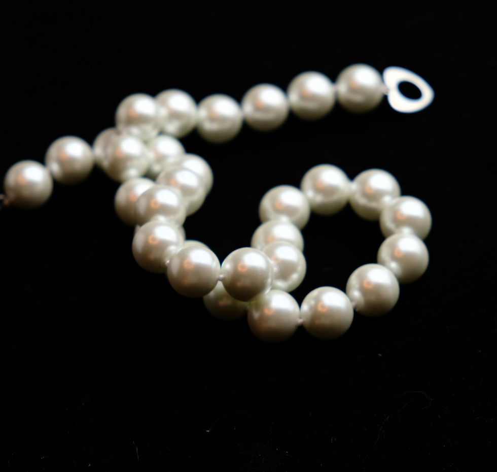 A spectacular bright white South Sea pearl shell necklace