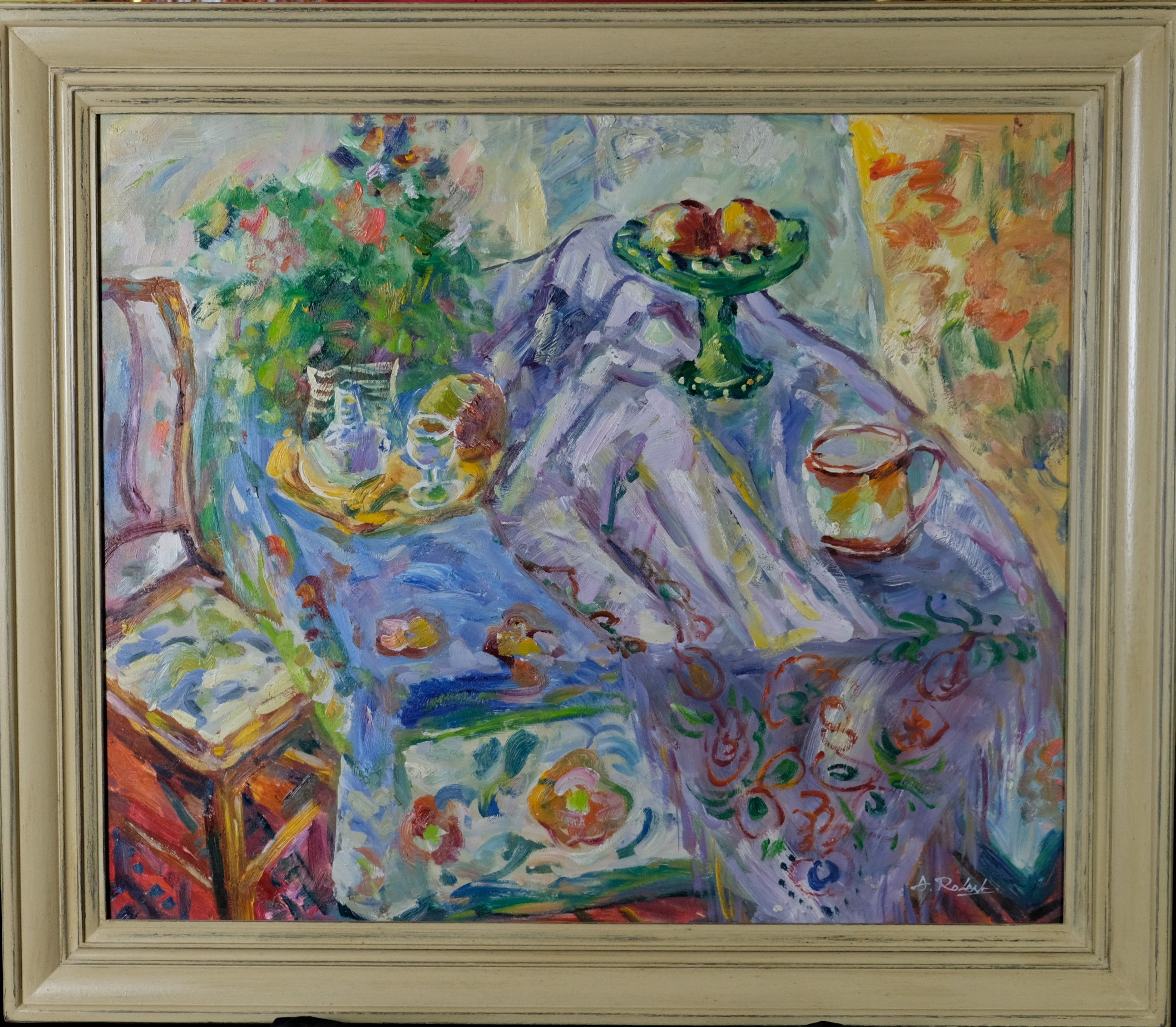 20th century interior scene with chair, fruit and mug on a table