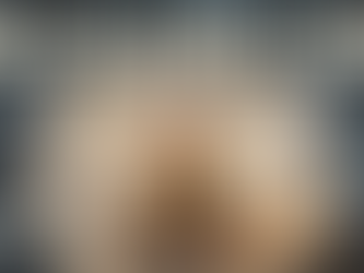 A women sitting with a singing bowl and eyes are looking staring at her