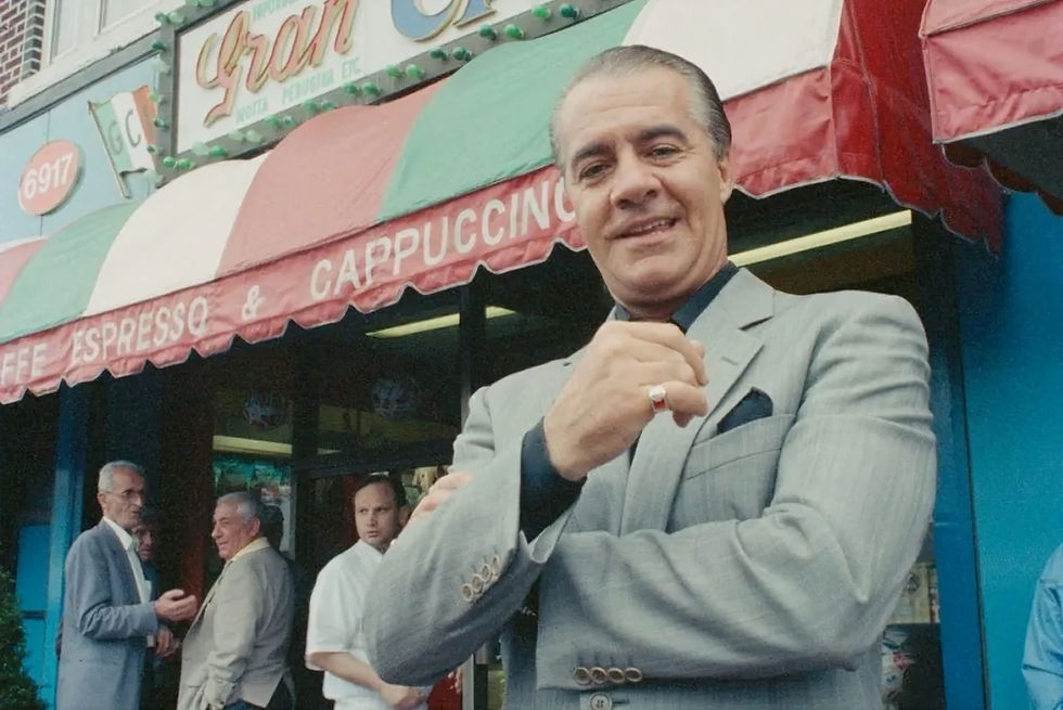 young Tony Sirico outside coffee shop