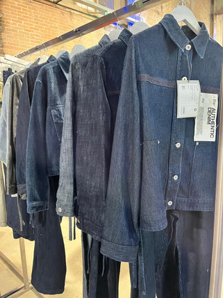 Rail of denim shirts