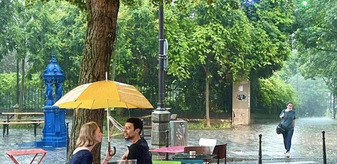 French tutor and student in a Paris park