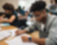 college student filling out papers.jpg