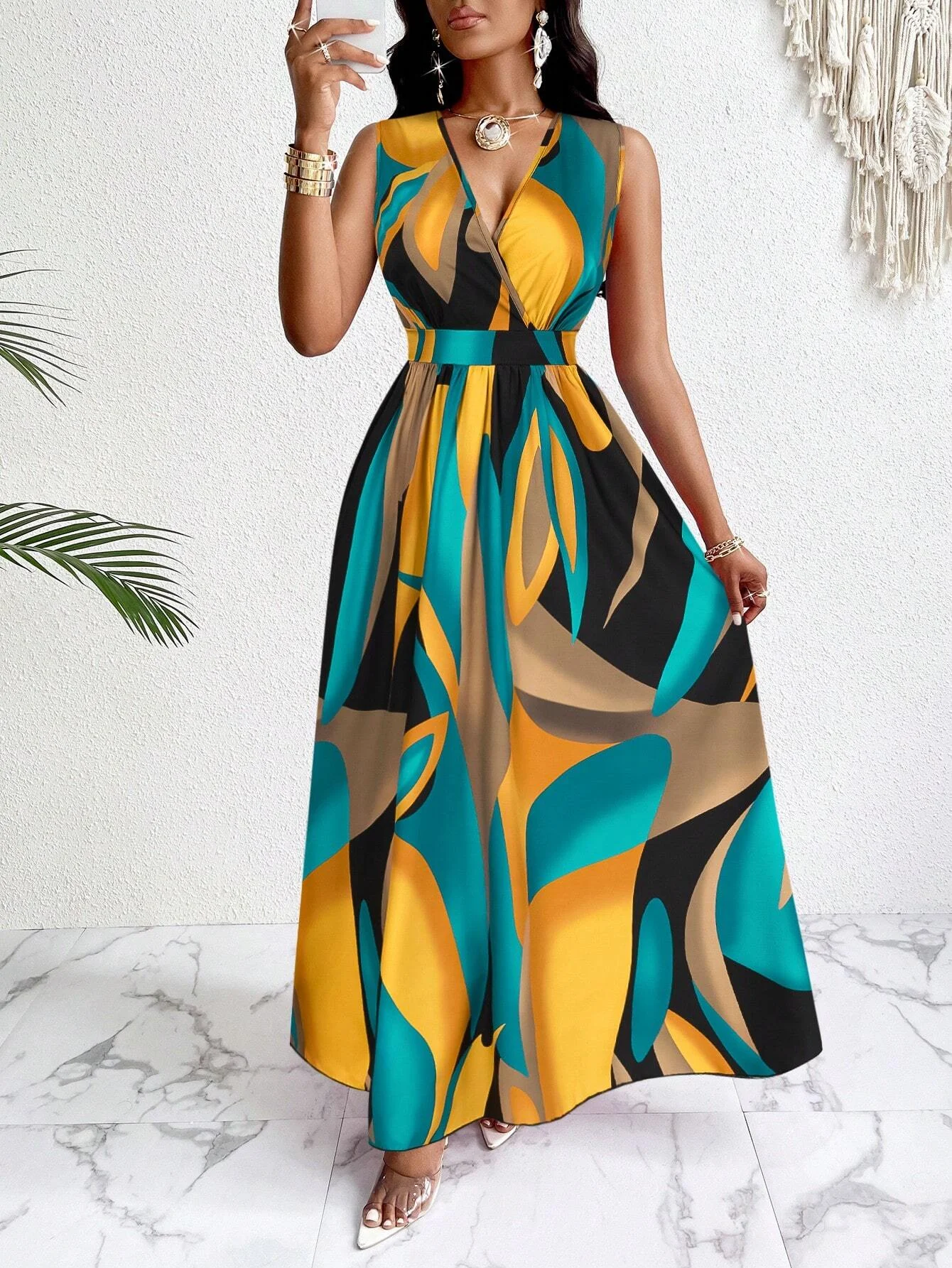 Women's sleeveless V-neck floor-length dress with abstract prints