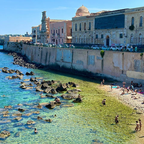 Sunbathers on Ortigia Beach