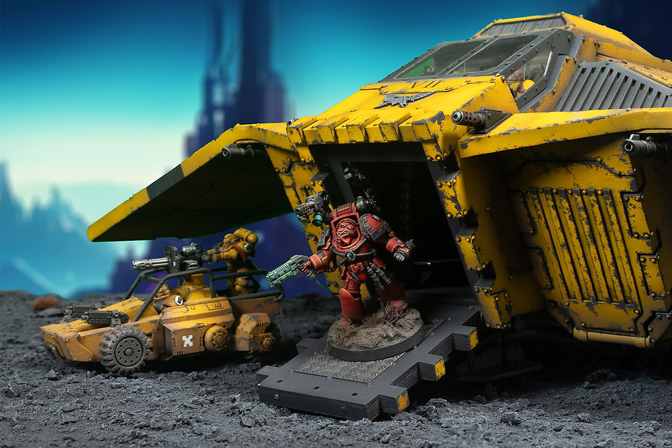 A Warhammer 40,000 scale Space Marine Overlord Gunship deploys a Terminator Techmarine and Primaris Invader ATV onto the battlefield.