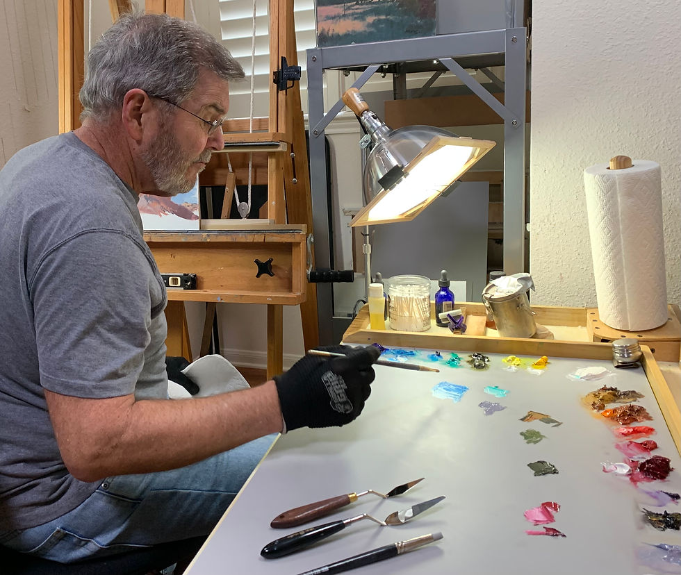 Roger Parsons at his easel painting