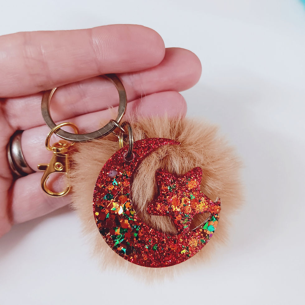 Copper Glitter Resin Moon Star on Tan Pom Pom Keychain