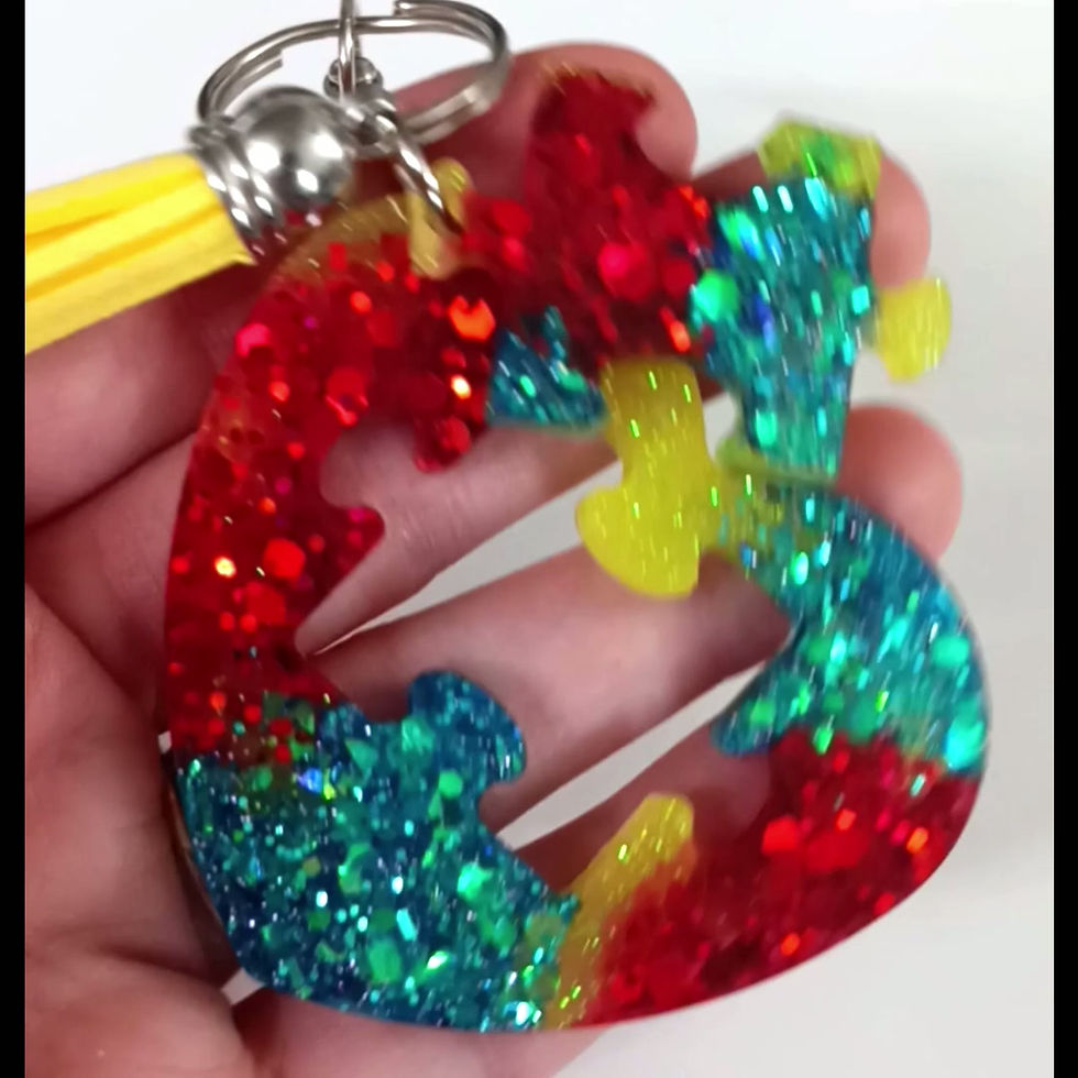 Thumbnail: Blue Red Yellow Glitter Puzzle Heart Resin Keychain