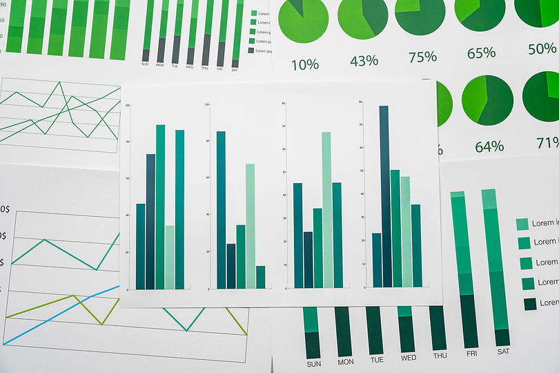 financial-paper-with-charts-and-diagrams-on-gray-t-2023-11-27-05-01-16-utc.jpg