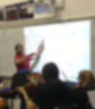 Ms. Wilkins in class, teaching.