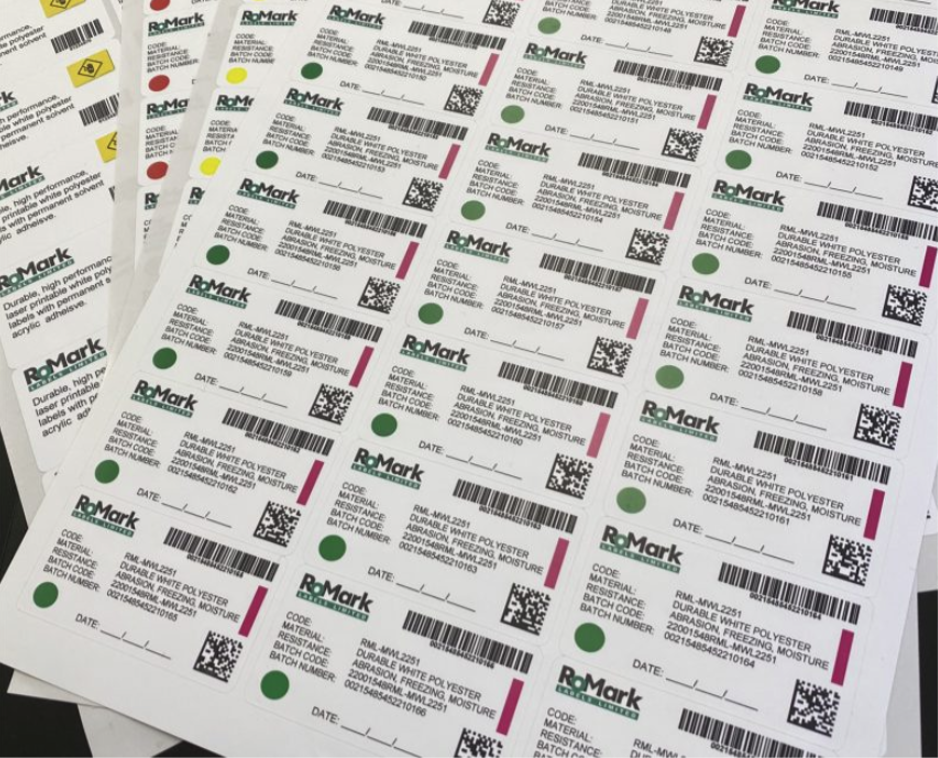 Sheets of durable laser printed labels