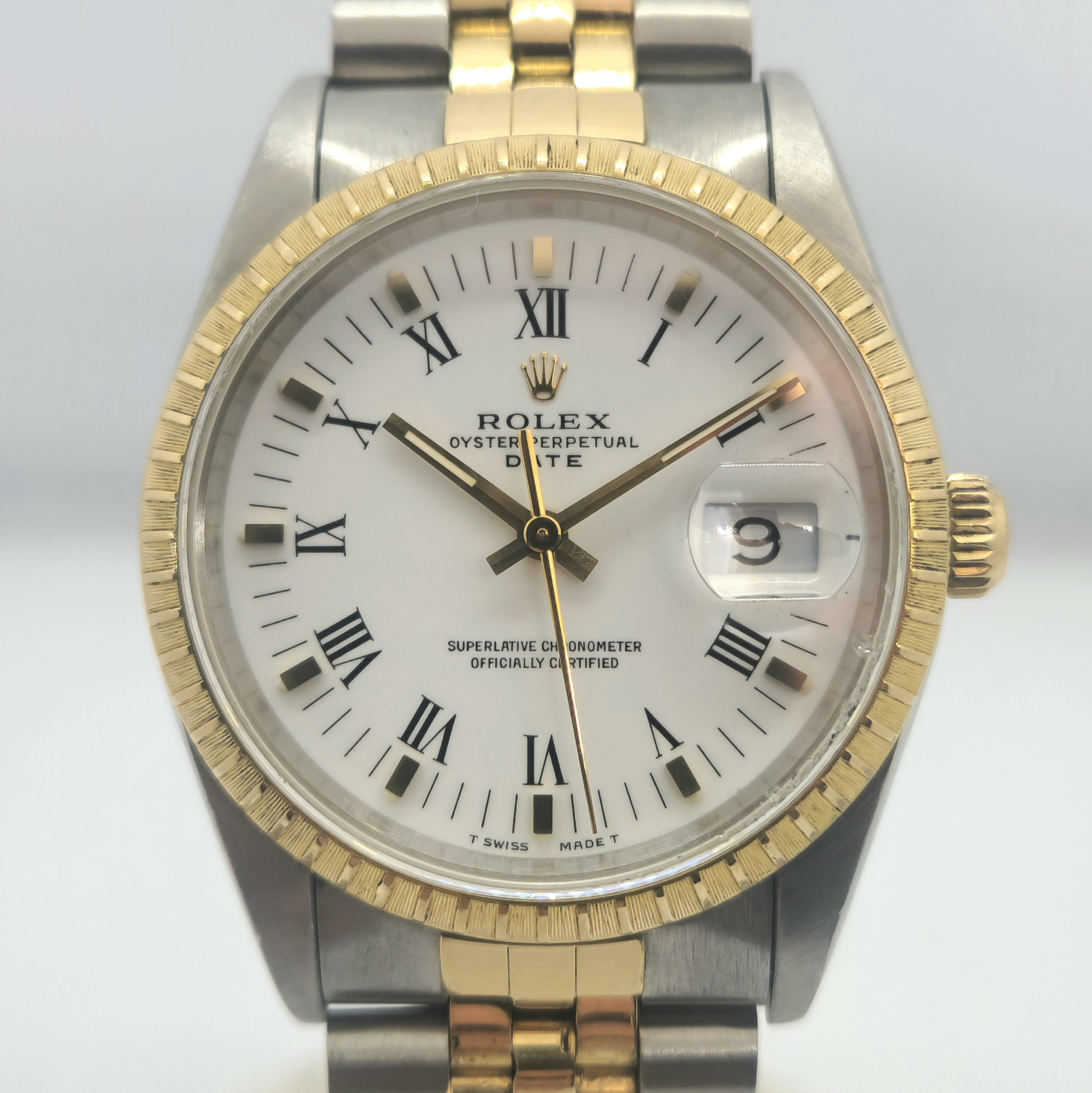 Reloj Rolex Oyster Perpetual Date bicolor acero y oro amarillo con esfera blanca romana en Joyería Recoleta