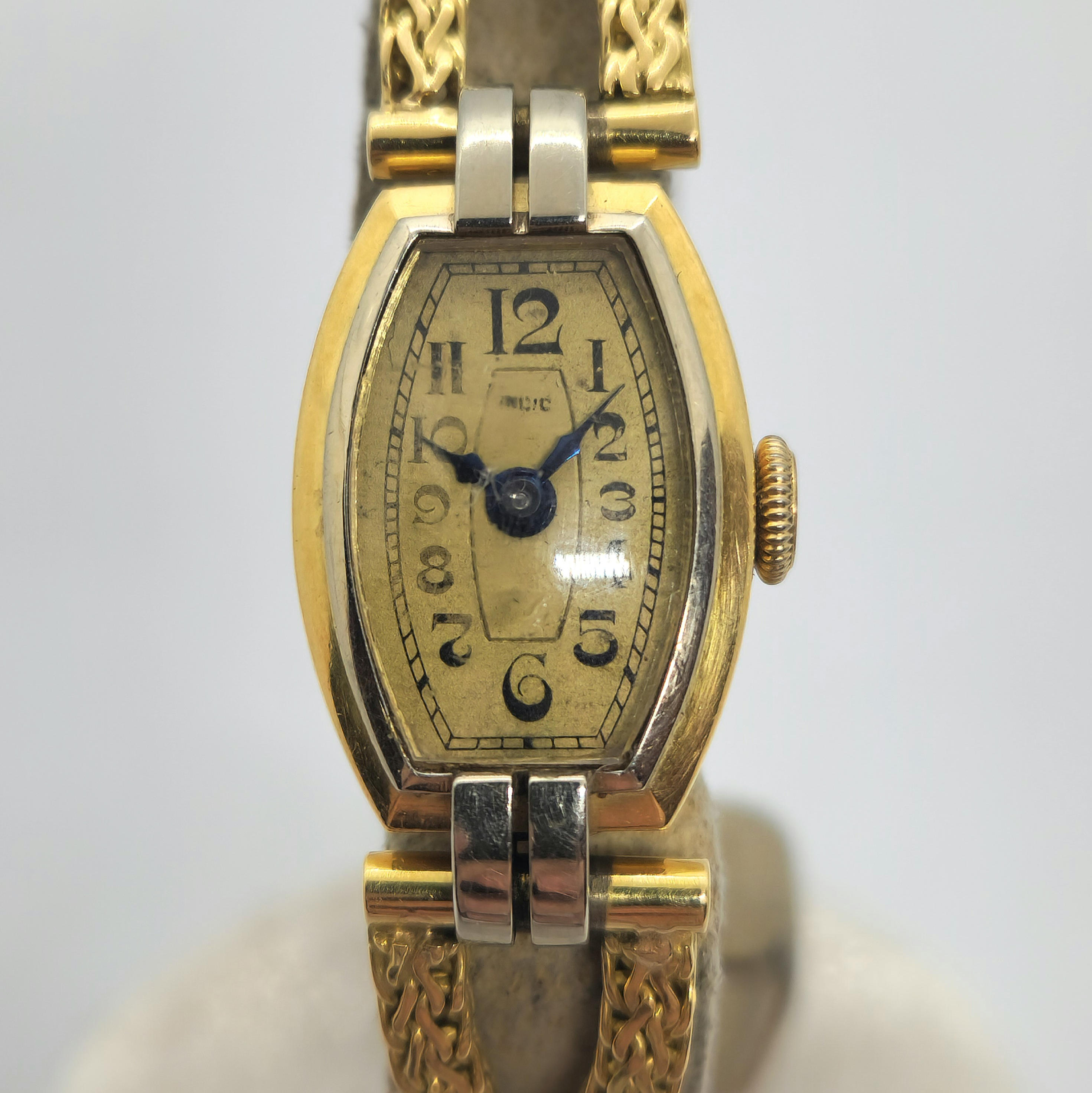 Reloj Art Deco dama caja bicolor oro y plata con pulsera trenzada dorada en Joyería Recoleta