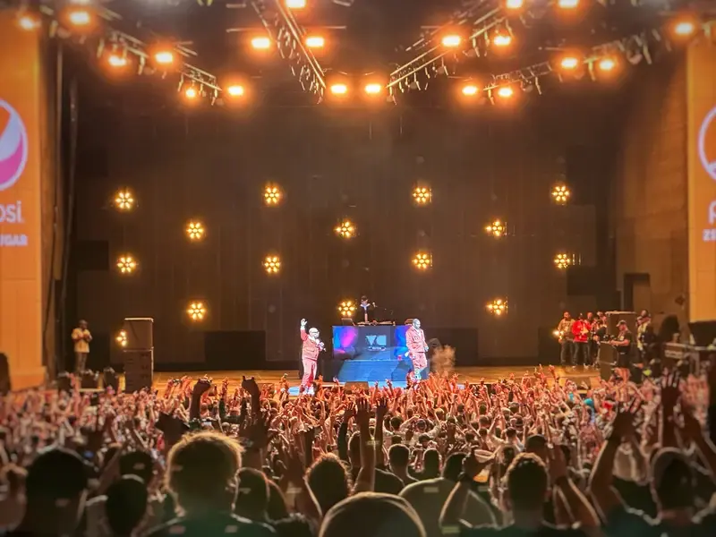 Live performance stage at VeeCon 2023 featuring concert lighting and LED display production