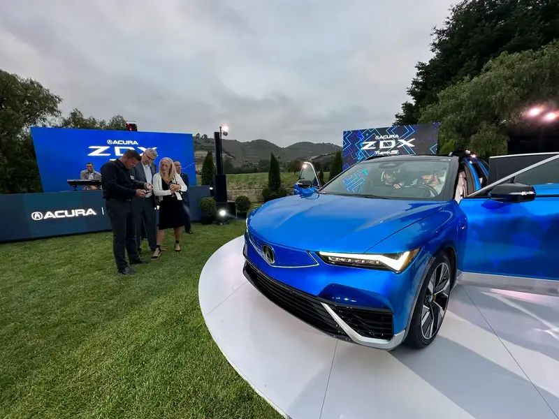 Guests viewing the newly revealed Acura ZDX during Monterey Car Week 2023 product launch event