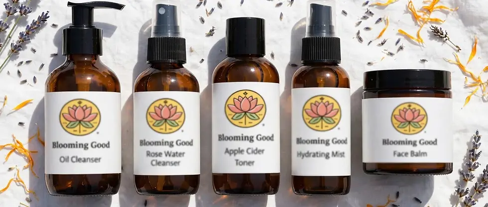 Studio photography of three amber glass skincare bottles arranged in a row. The minimalist labels feature a soft botanical logo, conveying a clean and natural aesthetic.