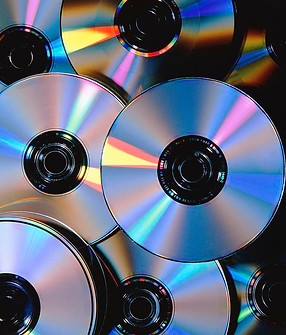 compact-discs-with-light-interference-patterns-damien-lovegrovescience-photo-library.jpeg