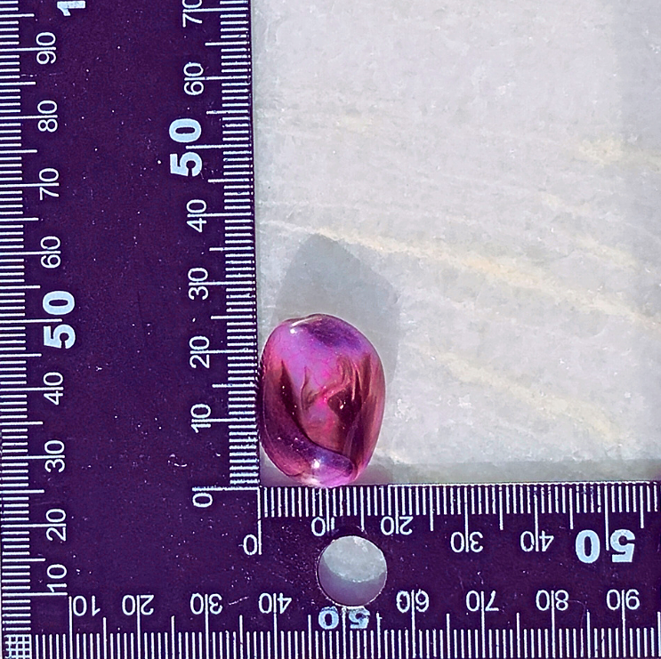 Thumbnail: Close up of 1n Purple Marbled Guru BEAD against a ruler to show scale