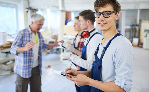 young-worker-at-construction-site-2021-09-24-03-02-21-utc-schmal.jpg