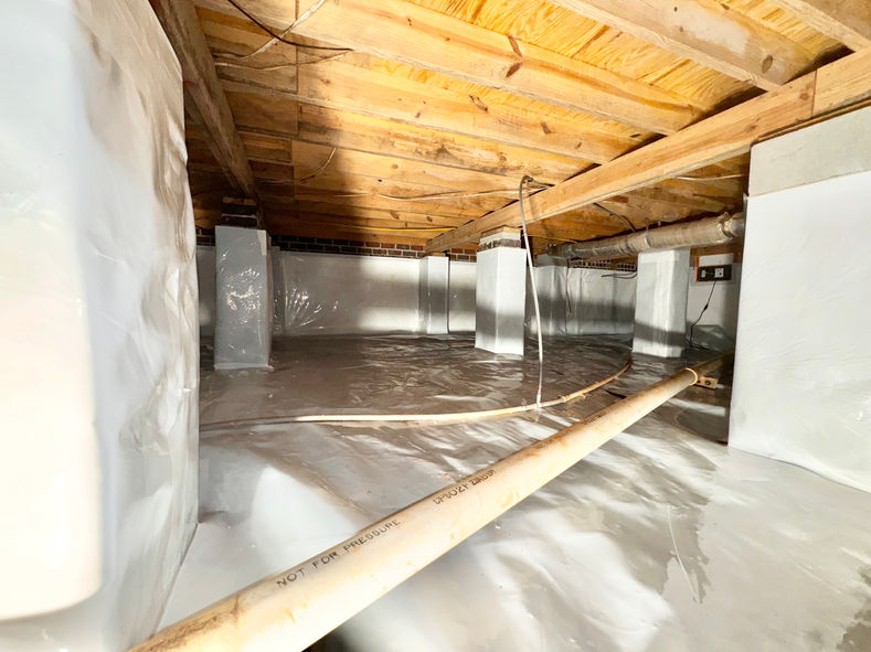 Crawl Space Improvements - Encapsulation with moisture barrier on the ground, columns, and the walls