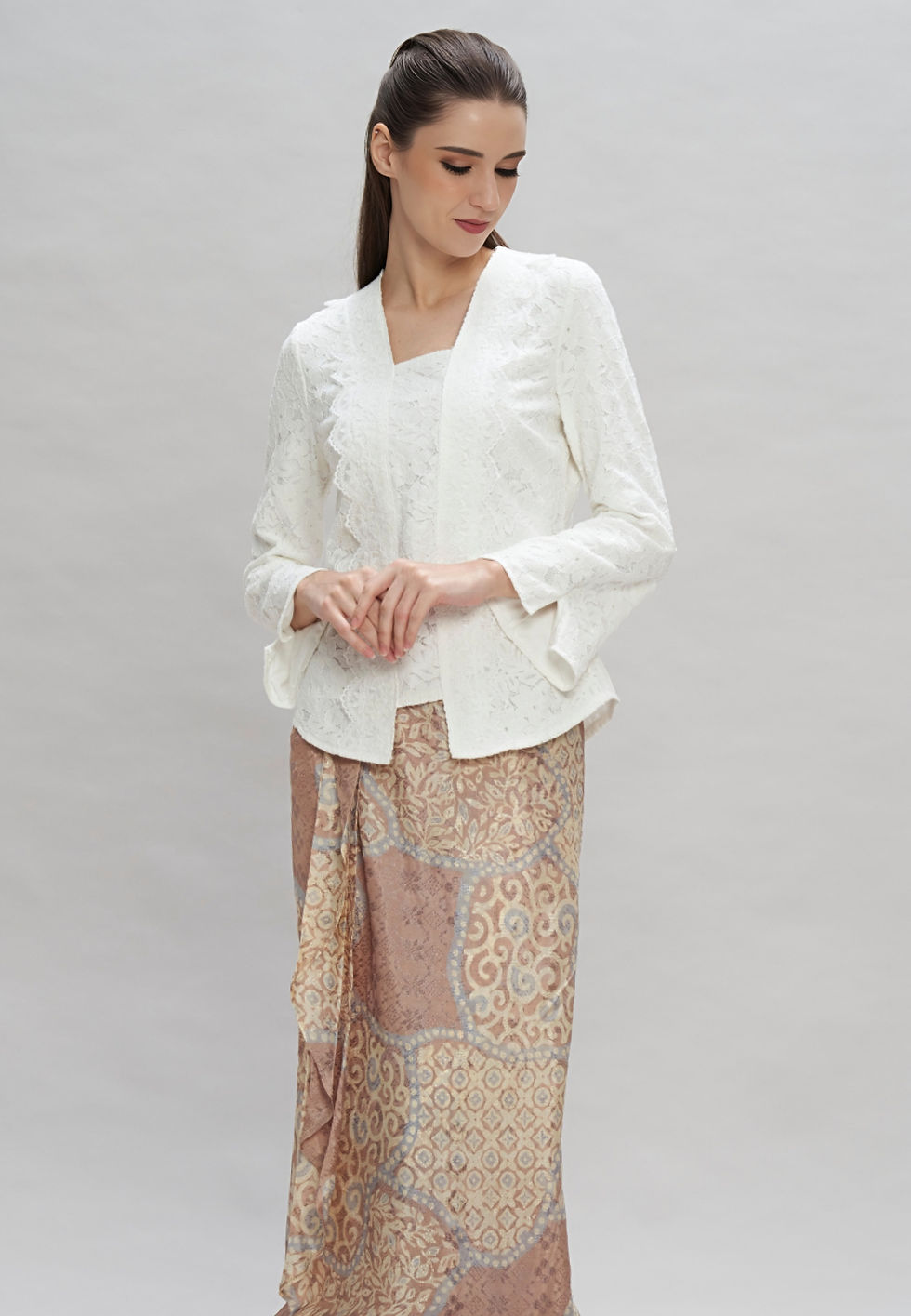 Thumbnail: shop white lace kebaya and beige batik skirt