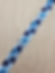 Light and dark blue flowers on white webbing