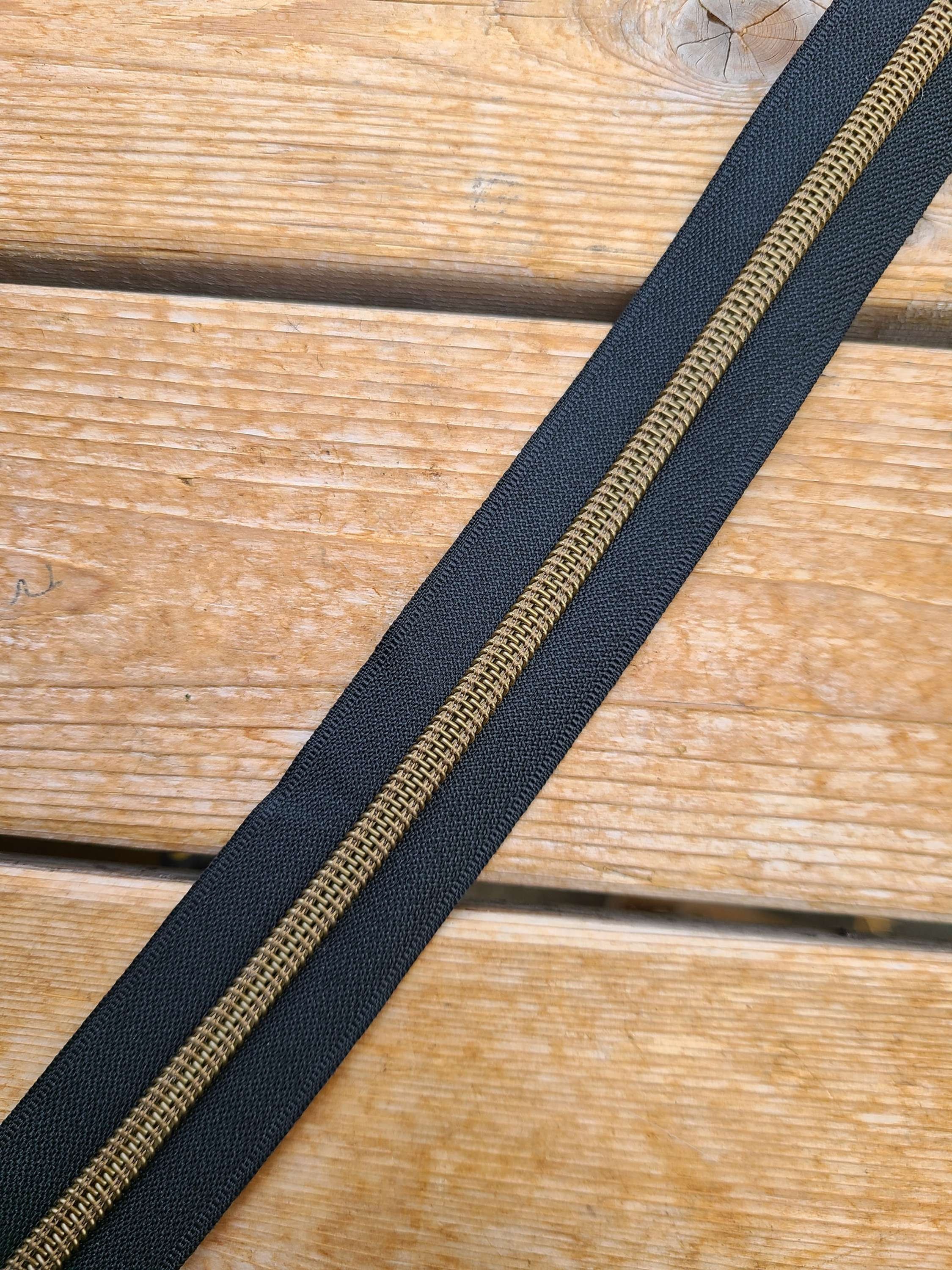 #5 Black tape with antique bronze teeth