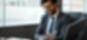 professional photo of a relieved business owner reviewing clean financials..jpg