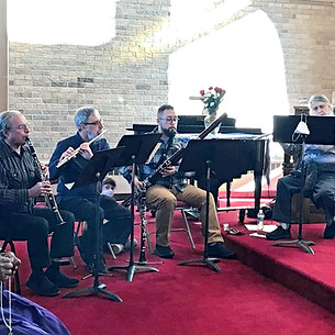 Brilliant Etesian Ensemble playing woodwind instruments during Advent services at Grace Church in Park Forest, IL.