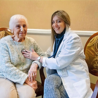 Dr. Goldfarb providing care to one of her lovely pateints