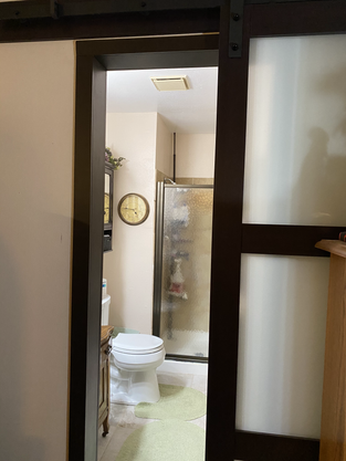 Barn door on bathroom