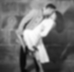 young-man-kissing-woman-street.jpg