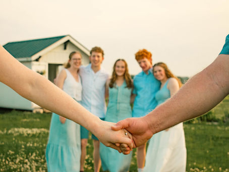 Family standing at Wild Blooms U Pick Farm in Wabash, Indiana