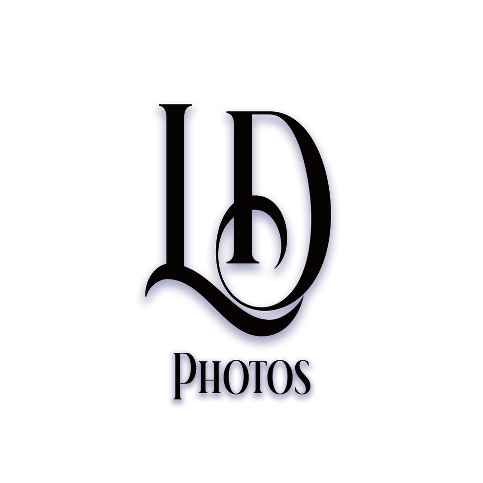 Logo with cursive "LD" on top and the word "Photos" on bottom