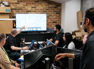 ProBuild360 team in a planning meeting