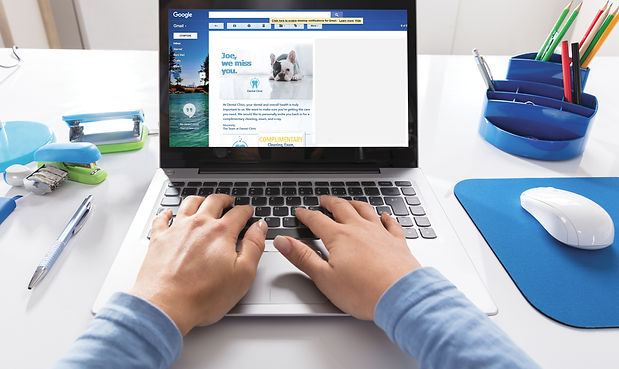 person creating personalized email on a laptop for patient reactivation