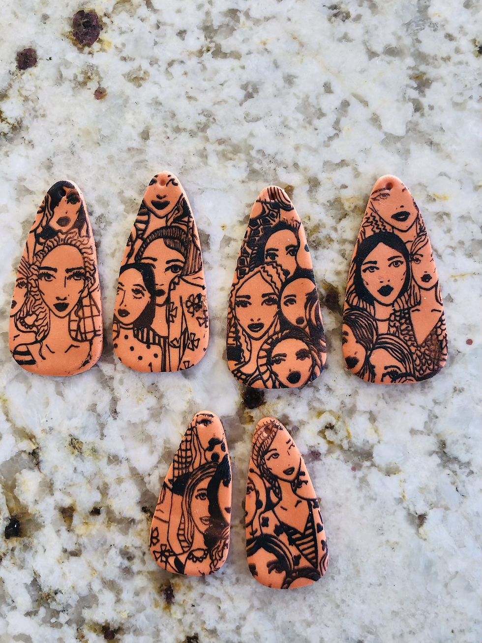Thumbnail: Black on orange silk screened earrings