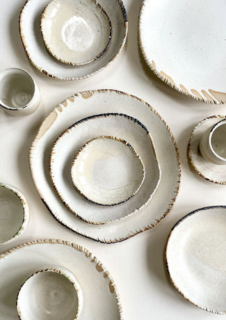 Handmade wabi sabi white tableware with organic raw edges