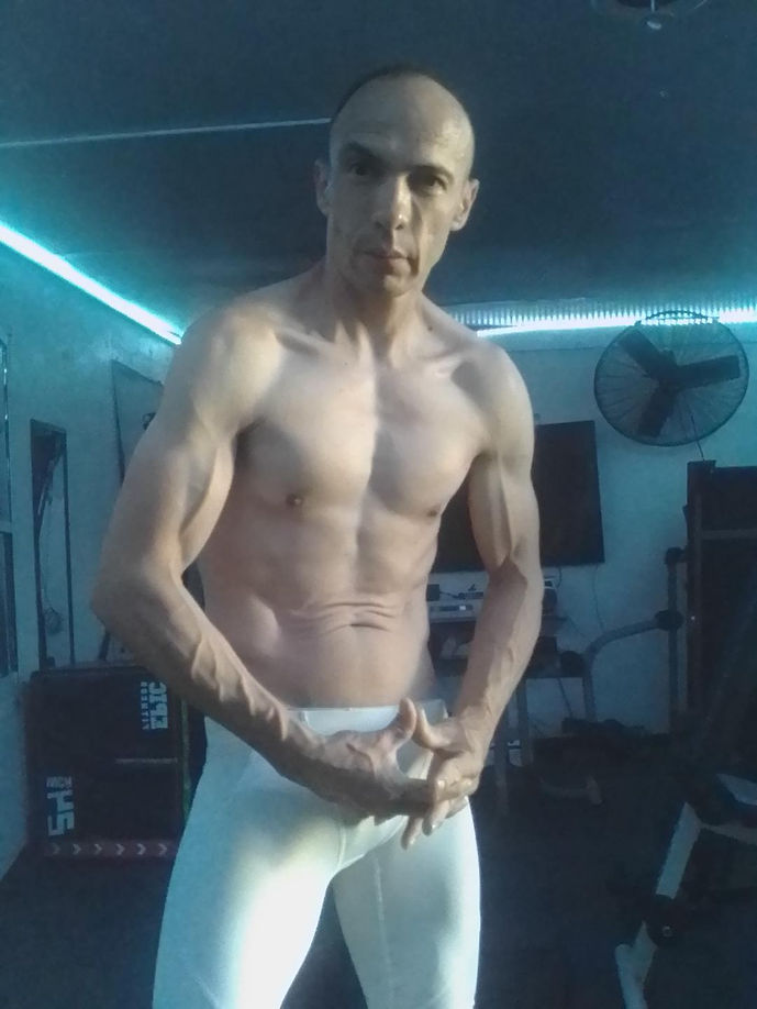me shirtless white attire front.jpg