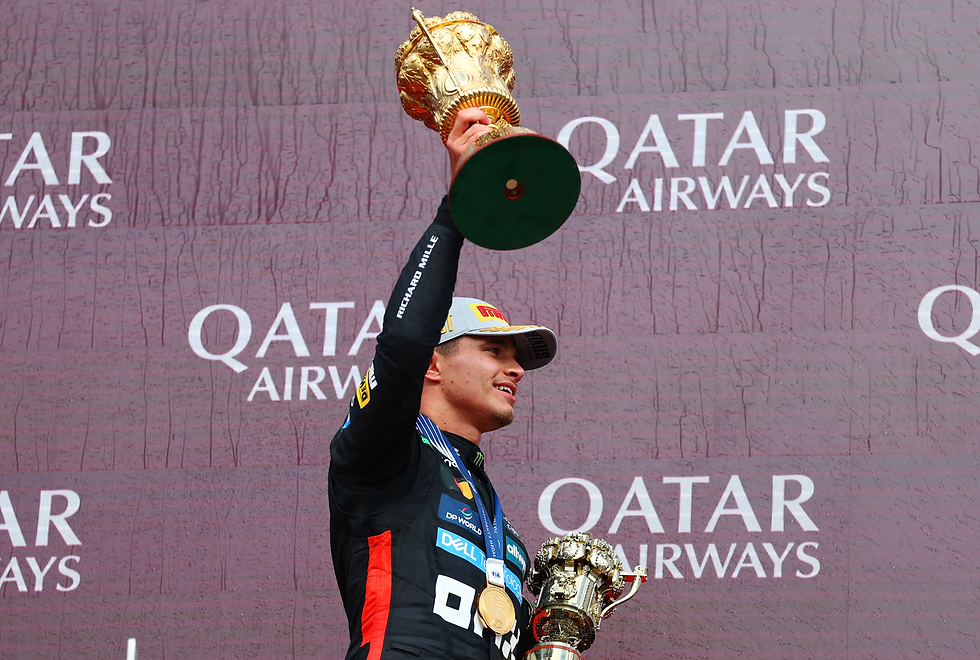 Lando Norris celebrating victory at the 2025 British Grand Prix