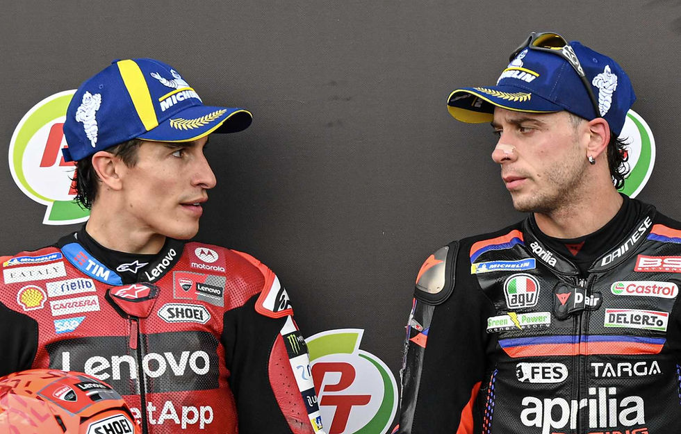Marc Márquez and Marco Bezzecchi looking at each other
