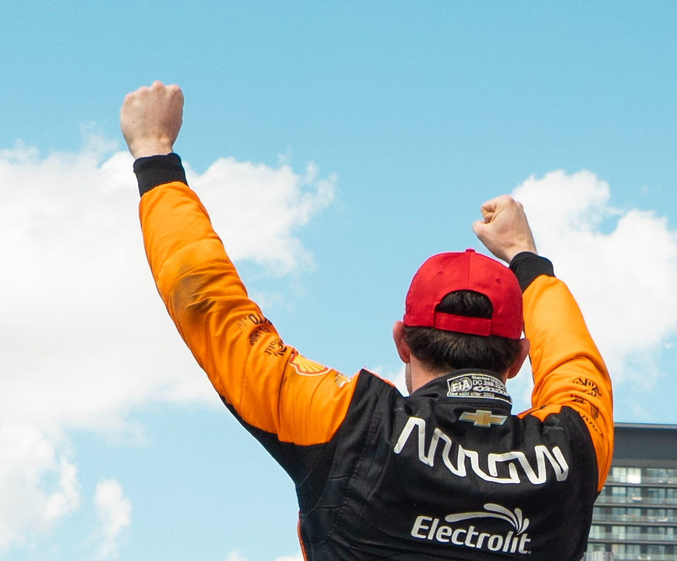 Pato O'Ward celebrates victory at the 2025 Indy Toronto