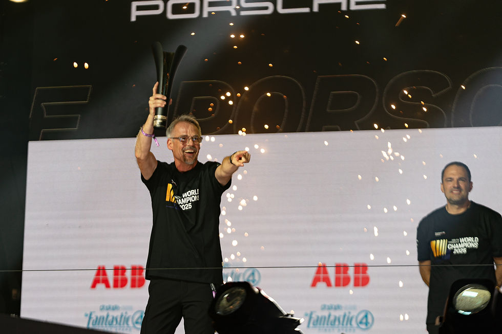 Thomas Laudenbach, VP of Porsche Motorsport, celebrates Porsche's title win in Season 11 | Credit: Ryan Fleming
