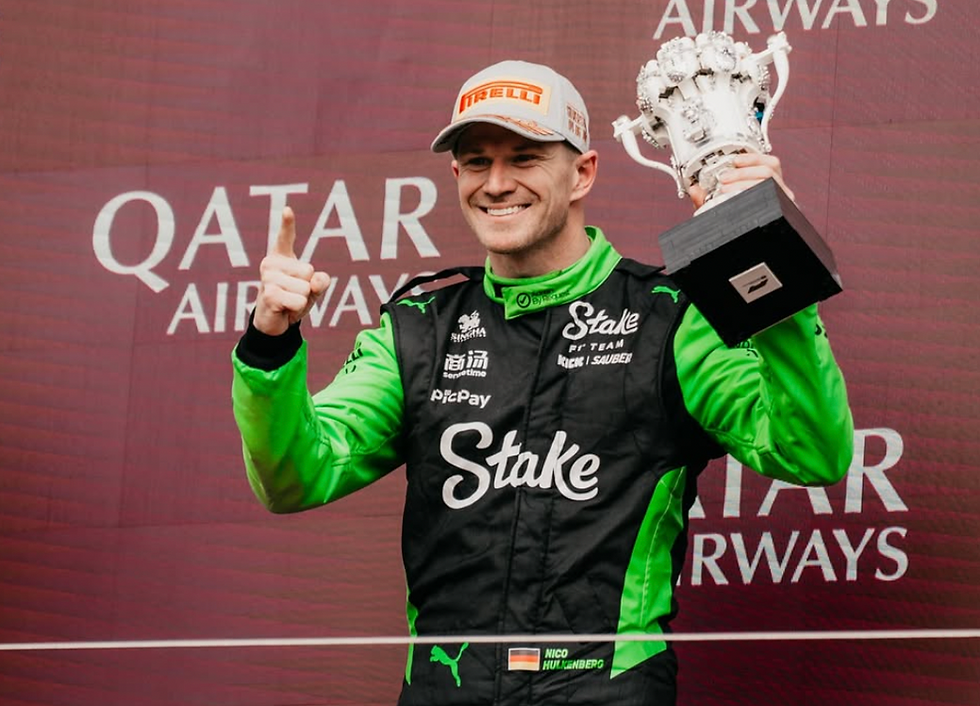 Hülkenberg holds the 2025 British Grand Prix third-place trophy after stepping on his first F1 career podium
