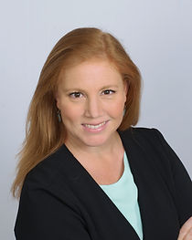 Headshot Teal Blouse CU.jpg
