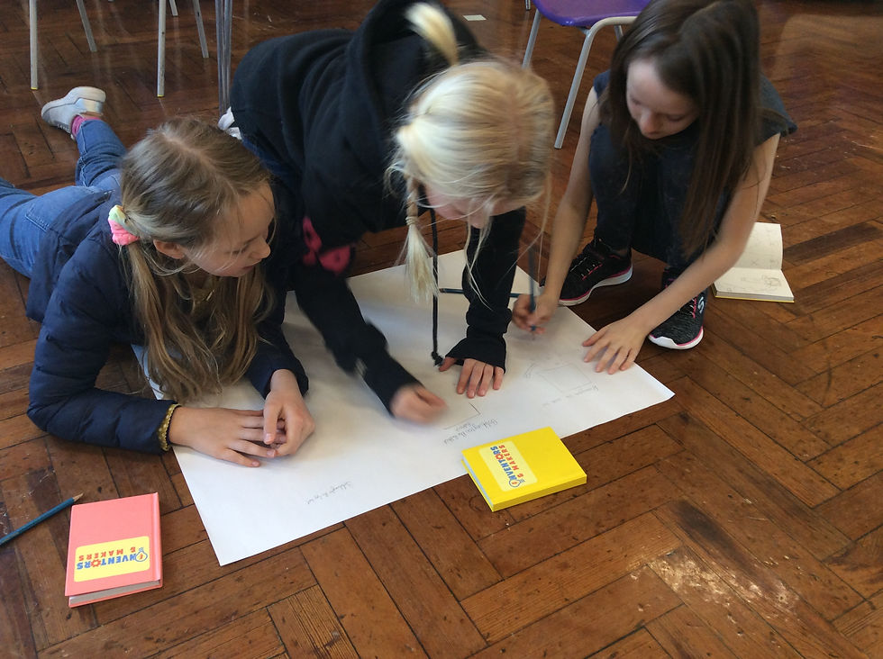 Children creating an invention