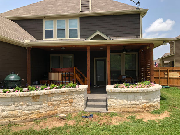 patio with flower beds